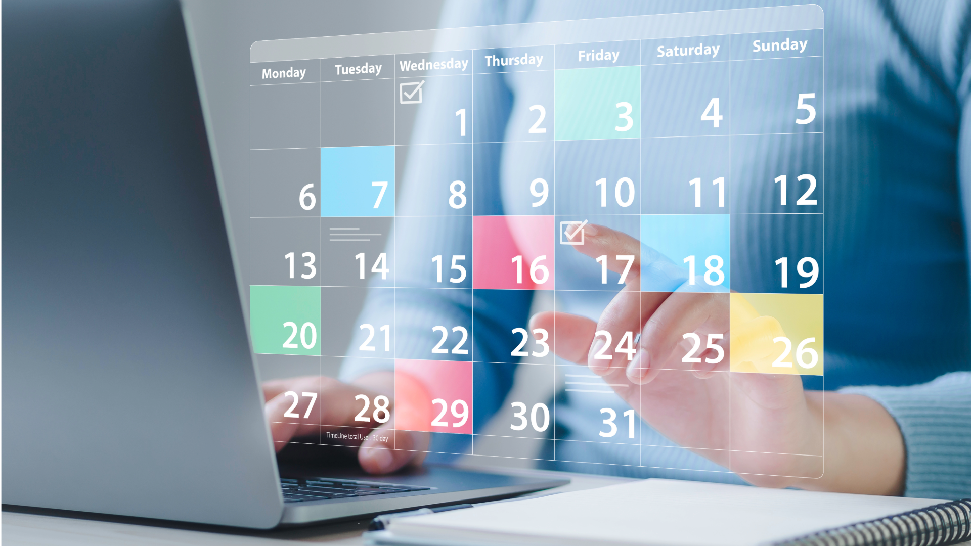 A person view an online calendar on a laptop PC.